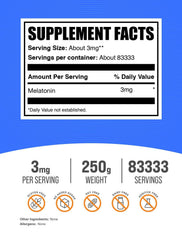 Measuring spoon beside BulkSupplements Melatonin Powder for precise dosing.
