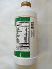 Buried Treasure Liquid Advantage Fulvic Minerals being poured into a glass for mixing.