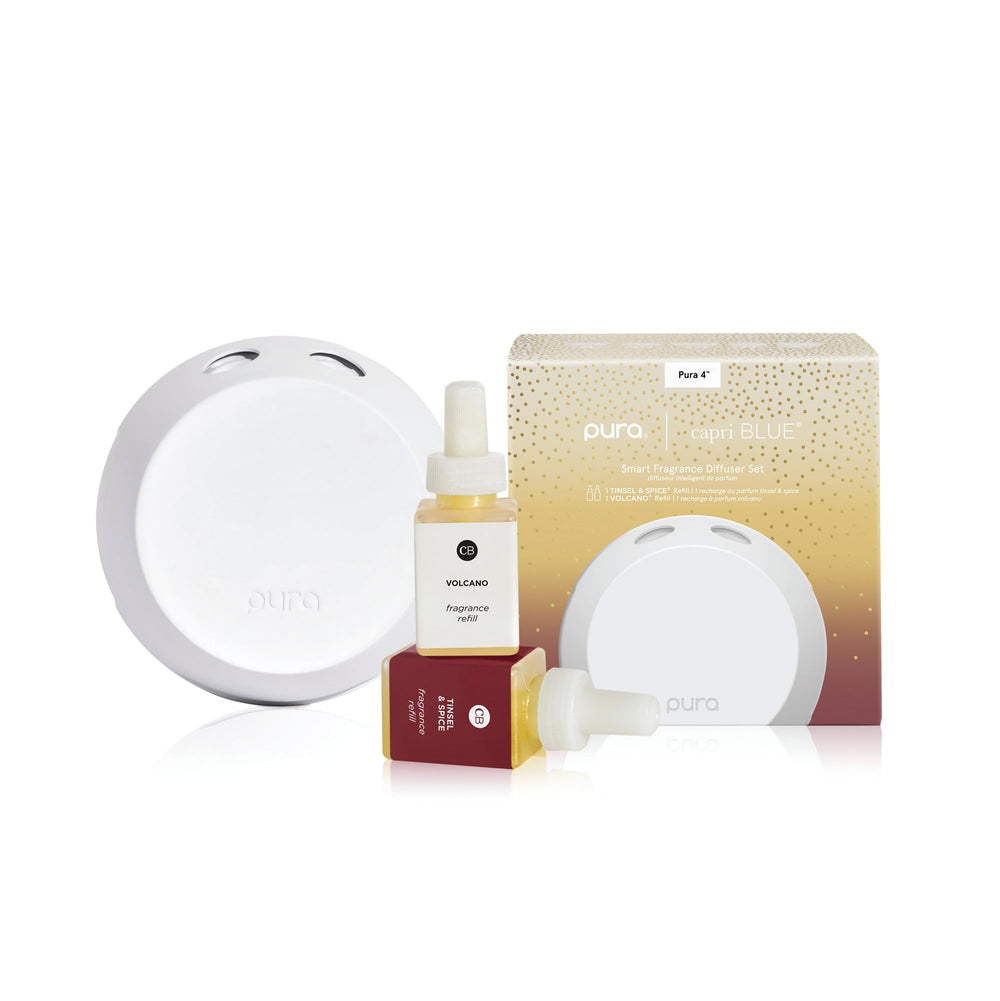 Capri Blue Pura4 diffuser plugged in delivering steady fragrance in any room