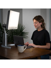 Carex Day-Light Classic Plus emitting light at a 12-inch distance for safety.