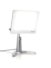 Carex Day-Light Classic Plus front view showing glare-free 10,000 lux therapy light.