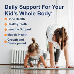 Carlson Kid's D3+K2 drops being added to food for convenient supplementation.