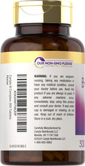Carlyle B-Complex bottle and tablets on a clean surface for daily wellness