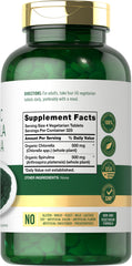 Carlyle chlorella spirulina tablets close-up showing compact vegetarian supplement