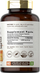 Carlyle bottle label close-up confirms pasture-raised origin and non-GMO formulation.