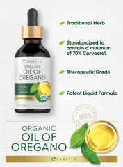 Carlyle Organic Oil of Oregano bottle on natural wood background