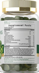 Carlyle Supergreens Gummies bottle with gummies ready to take