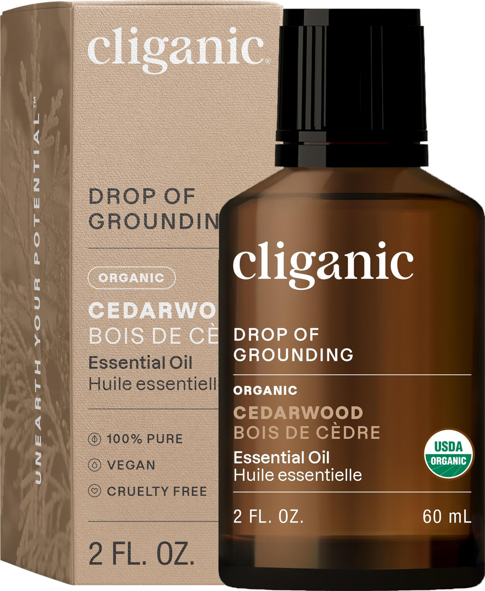Cliganic Cedarwood essential oil bottle for pure aromatherapy diffusion.