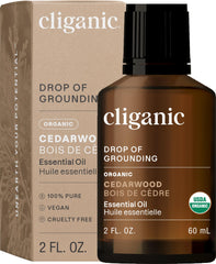 Cliganic Cedarwood essential oil bottle for pure aromatherapy diffusion.