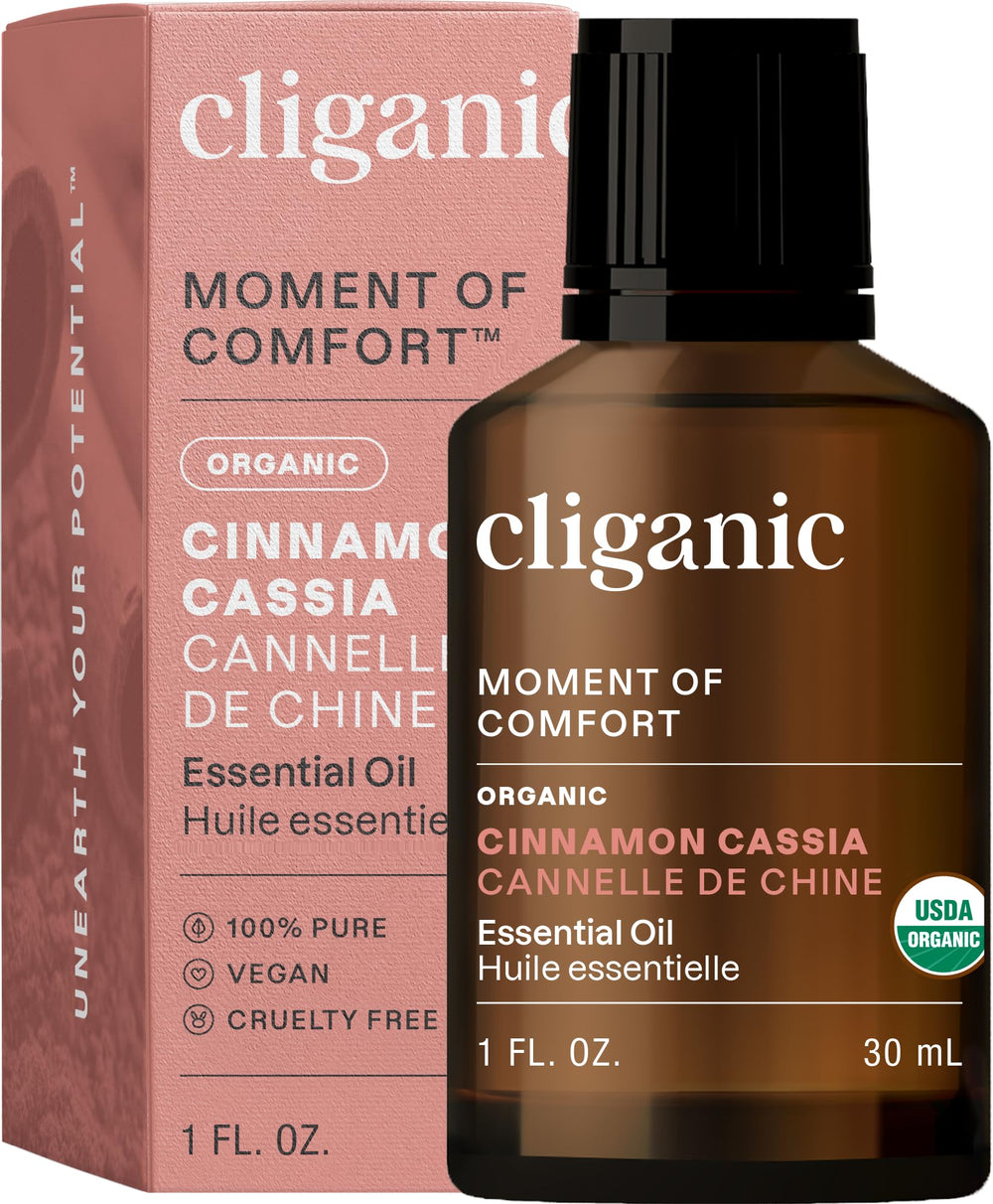Cliganic cinnamon cassia essential oil bottle for pure aroma in a diffuser.