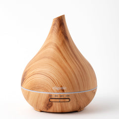 Cliganic Ultrasonic Aromatherapy Diffuser with 7-color LED lights for ambience.