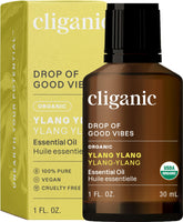 Cliganic Ylang Ylang oil bottle with dropper, calming aroma for diffuser use.