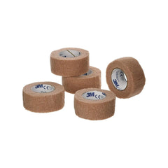 Coban self-adherent tan wrap securing dressings without clips
