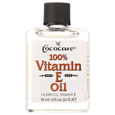 COCOCARE Vitamin E Oil bottle pour for daily skin hydration and antioxidant protection