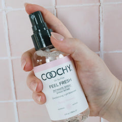 Coochy peony scent bottle emphasizes a soft, aromatic fragrance.