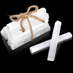 Covzoe selenite sticks on a desk for meditation focus.
