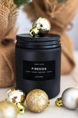 Craft & Kin smoky fireside candle with black design for a bold living space