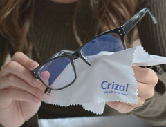 Crizal microfiber cloth protecting AR coatings during routine cleaning