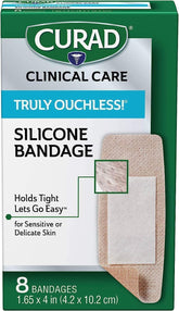 Curad Truly Ouchless XL bandages in pack with gentle silicone adhesive.