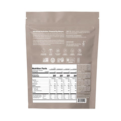 Cure Hydration packet dispensing into water for easy mixing.