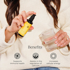 CYMBIOTIKA bottle dispensing drops shown for convenient use and absorption.