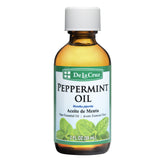 De La Cruz Peppermint Oil bottle for refreshing aromatherapy sessions