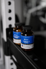 Close-up of Designs for Sport HI-PO softgels showing smooth capsules