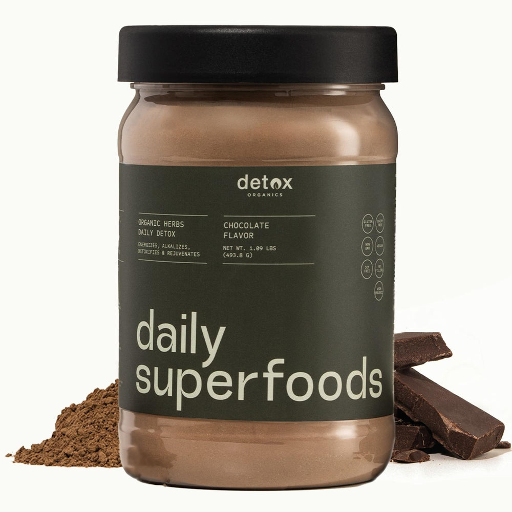 Detox Organics chocolate superfood powder tub ready for daily greens boost