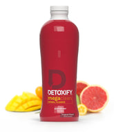 Detoxify Mega Clean tropical bottle front highlights a herbal cleansing for whole-body refreshment.