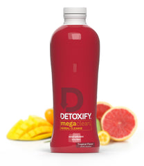 Detoxify Mega Clean tropical bottle front highlights a herbal cleansing for whole-body refreshment.