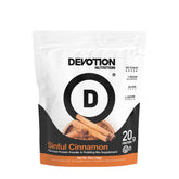 Devotion Nutrition Sinful Cinnamon protein powder tub with scoop, perfect for keto-friendly shakes.