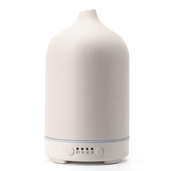 Diffuserlove ceramic diffuser 250ml with elegant cover for stylish bedroom aromatherapy.