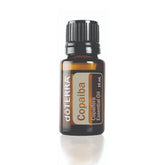 doTERRA Copaiba bottle close-up with resin-rich oil for calming skincare.