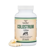 Double Wood Colostrum bottle front displaying 1,000 mg capsules.