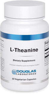 Douglas Laboratories L-Theanine capsule close-up showing a 100 mg dose for calm support