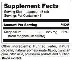 Pouring Douglas Laboratories Liquid Magnesium into a glass for daily mineral balance