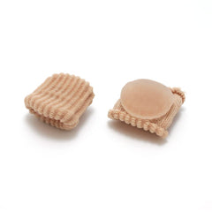 Dr. Jill's Foot Pads soft fabric sleeve shields toes during wear for comfort.