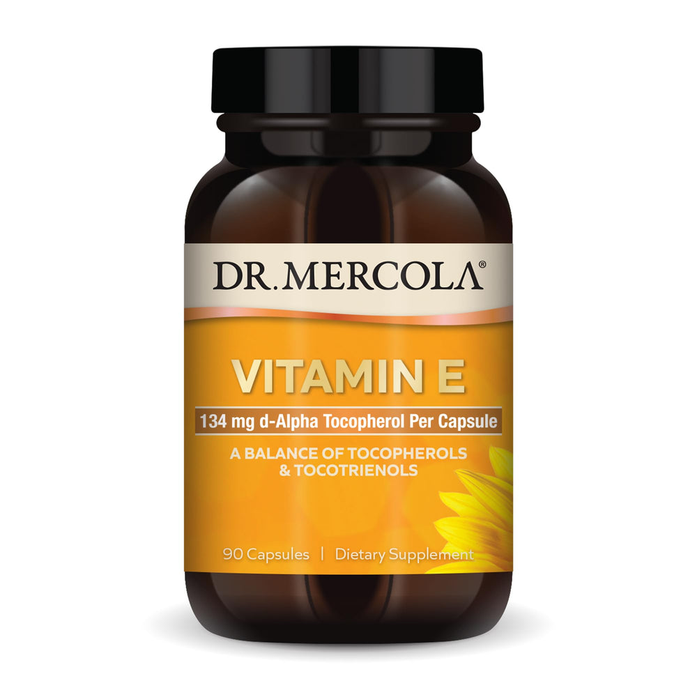 Dr. Mercola Vitamin E bottle with capsules supports daily skin care.