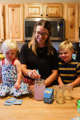 Family using Dr Price's Cal-Mag Vites at home for convenient daily intake.