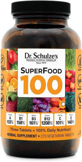 Dr. Schulze's SuperFood 100 bottle label shows plant-based nutrition for daily wellness.