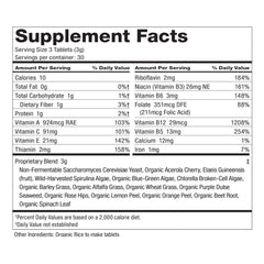 Dr. Schulze's SuperFood 100 serving spoon beside bottle for easy daily intake