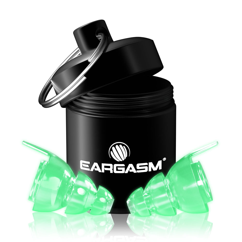 Eargasm Afterglow earplugs glow in hand, portable protection for nights out.