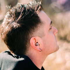 Eargasm earplugs during motorcycle rides provide noise reduction and comfort.