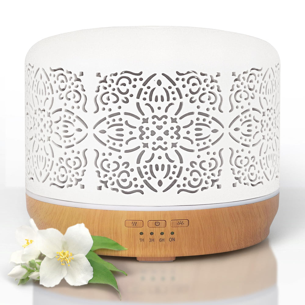 Earnest Living essential oil diffuser with white ceramic 500 ml base for home aromatherapy.