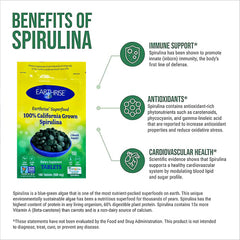 Earthrise spirulina tablets held in hand illustrating convenient daily dosing for plant-based diets.