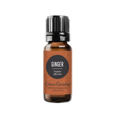 Edens Garden Ginger Essential Oil bottle pour showing warm aroma ready for diffuser use