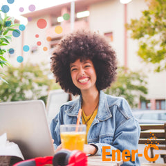 Ener-C Orange powder dissolving in water with real fruit flavor.