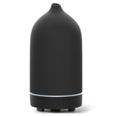 ENILYM Essential Oil Diffuser with ceramic cover for serene home aromatherapy.