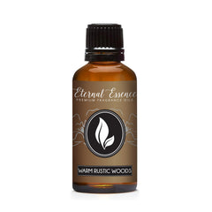 Eternal Essence Oils Warm Rustic Woods bottle close-up with dropper for precise blending.