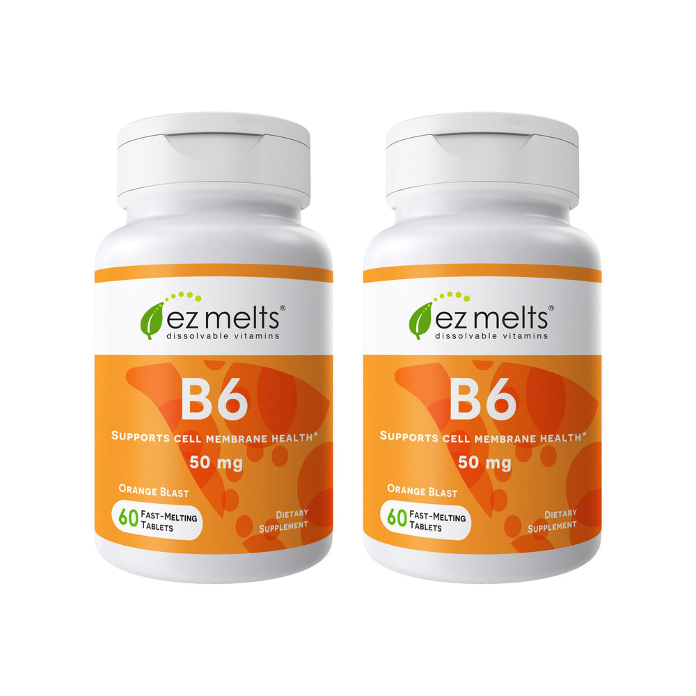 EZ Melts B6 50 mg orange dissolving tablet held in fingers, on-the-go energy option.